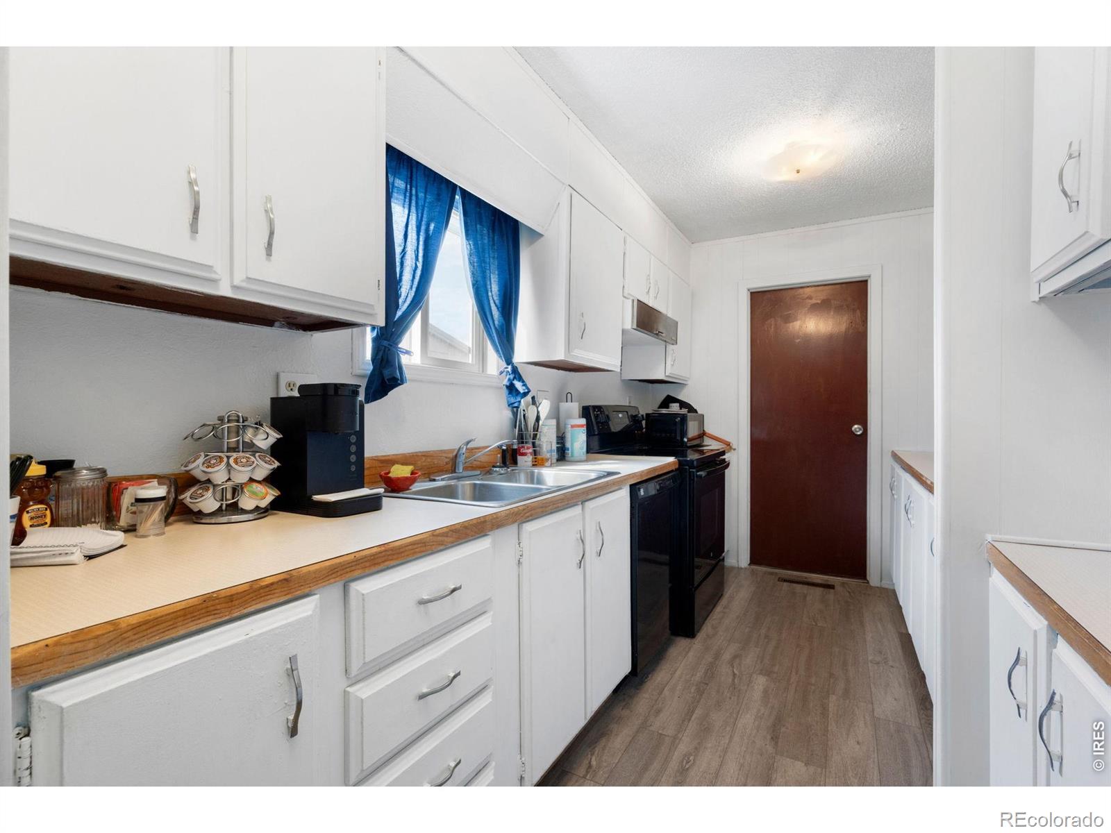 110 Ash Street Log Lane Village CO 80705