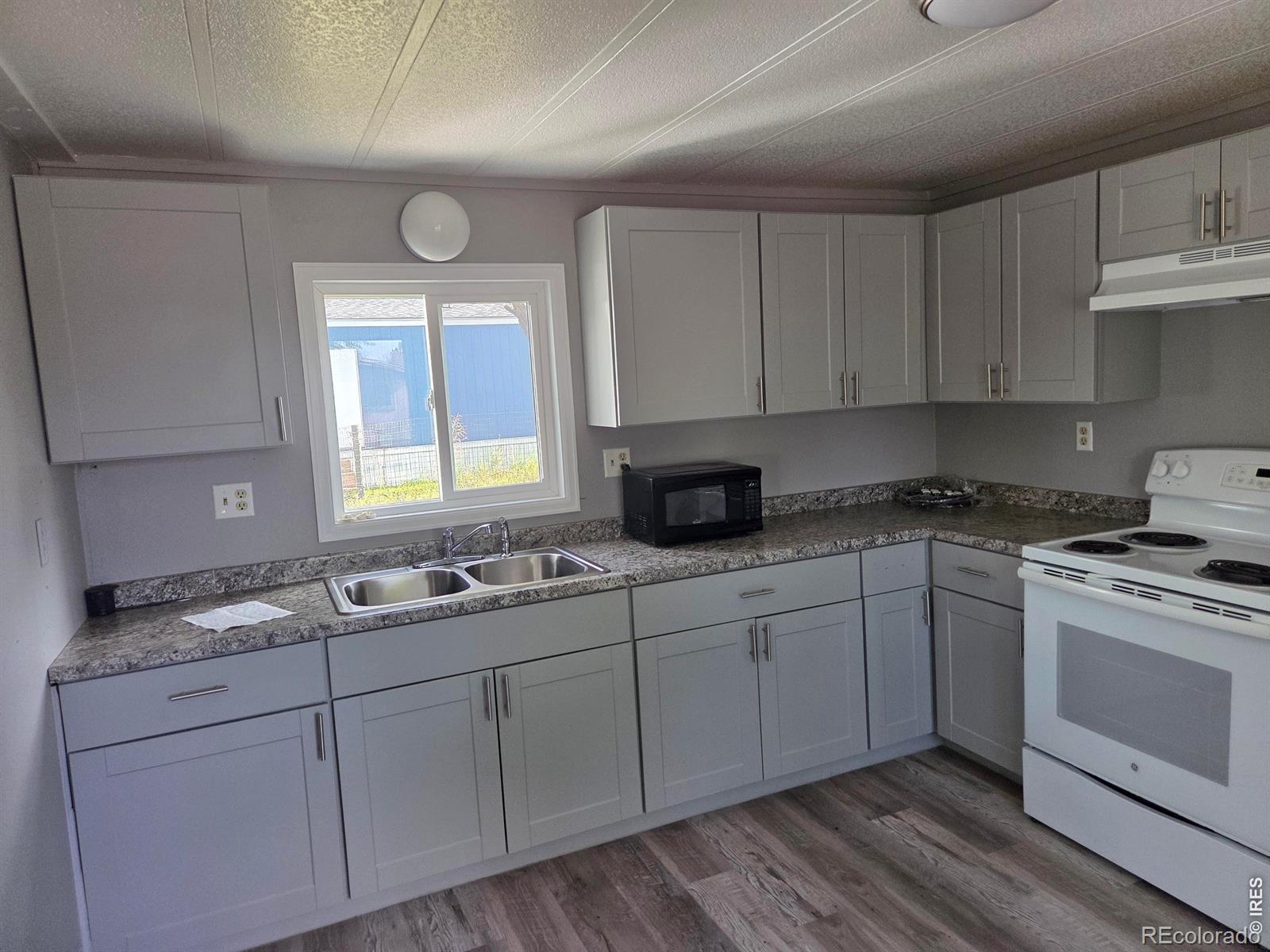 101 Larch Drive Log Lane Village CO 80705