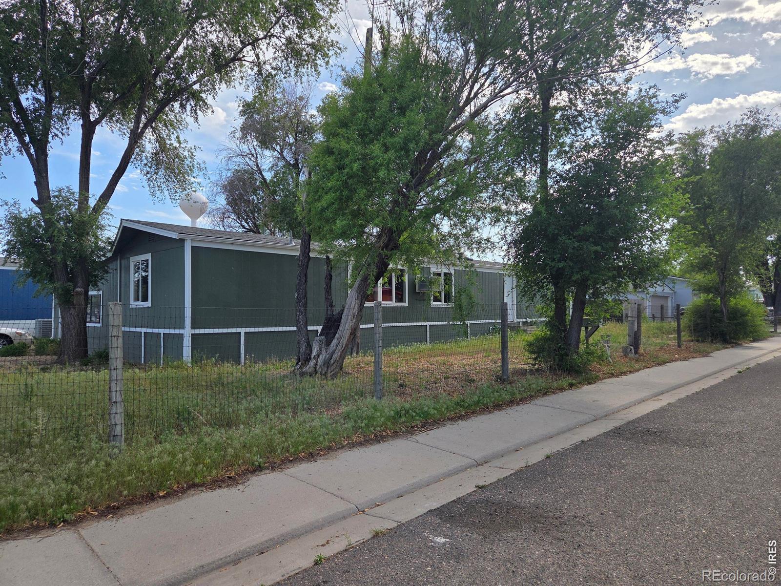 101 Larch Drive Log Lane Village CO 80705