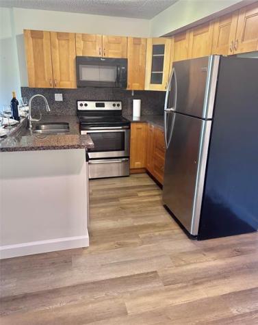 841 Lyons Road Coconut Creek FL 33063