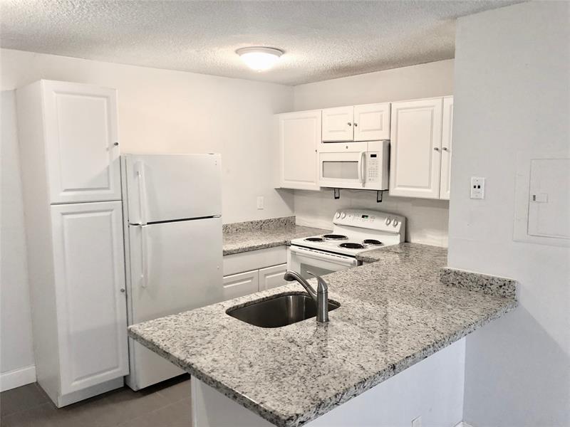651 Lyons Road Coconut Creek FL 33063