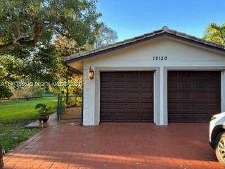 12150 NW 28th Court Plantation FL 33323
