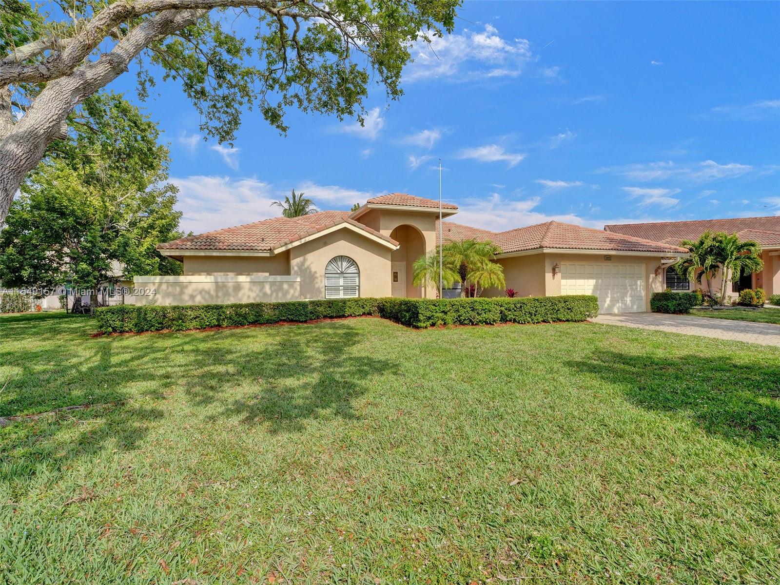 9077 NW 52nd Court Coral Springs FL 33067