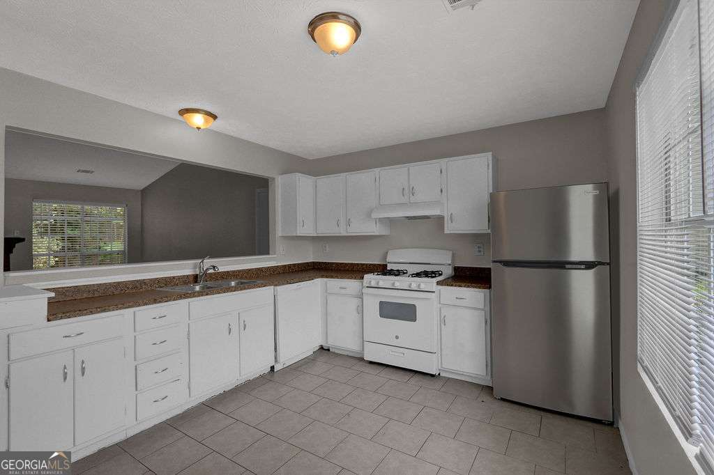 1234 Wellhouse Walk Stone Mountain GA 30088