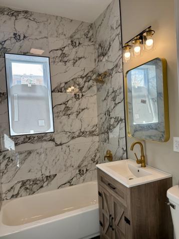 7144 South Saint Lawrence Avenue Chicago IL 60619