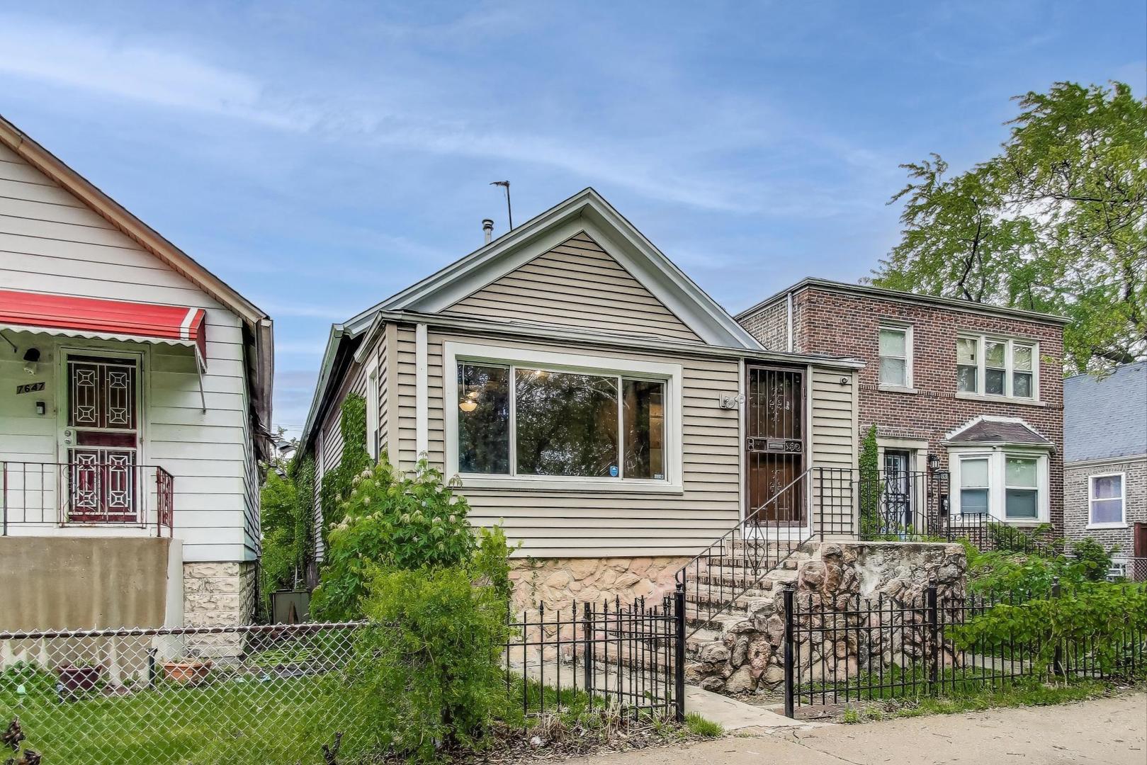 7649 South Dobson Avenue Chicago IL 60619
