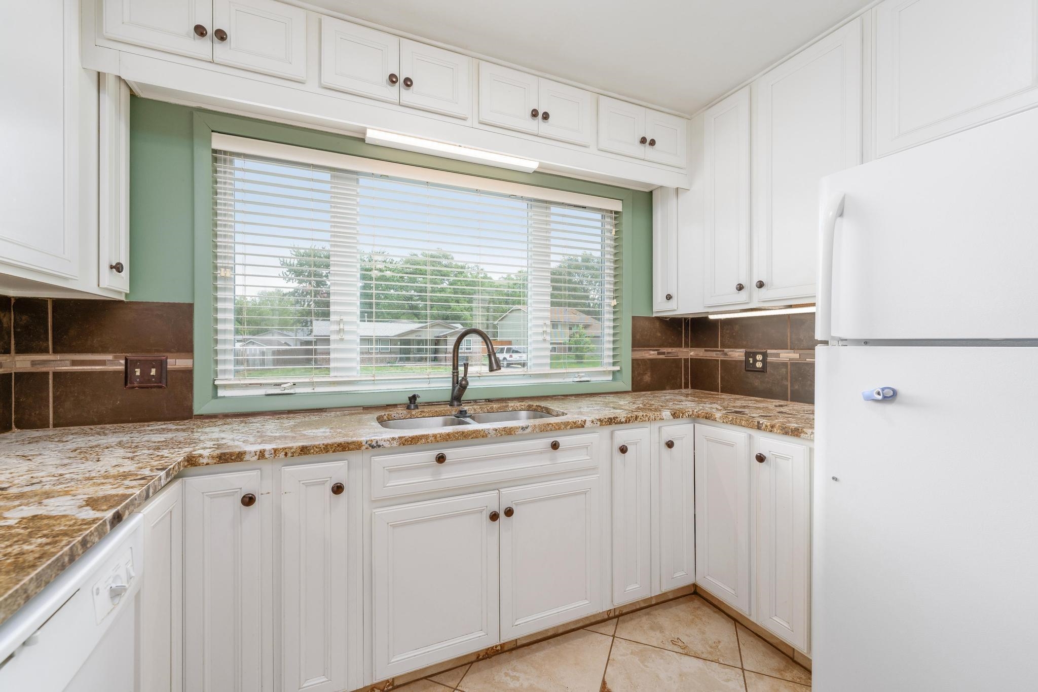 6523 N Kerman Drive Park City KS 67219