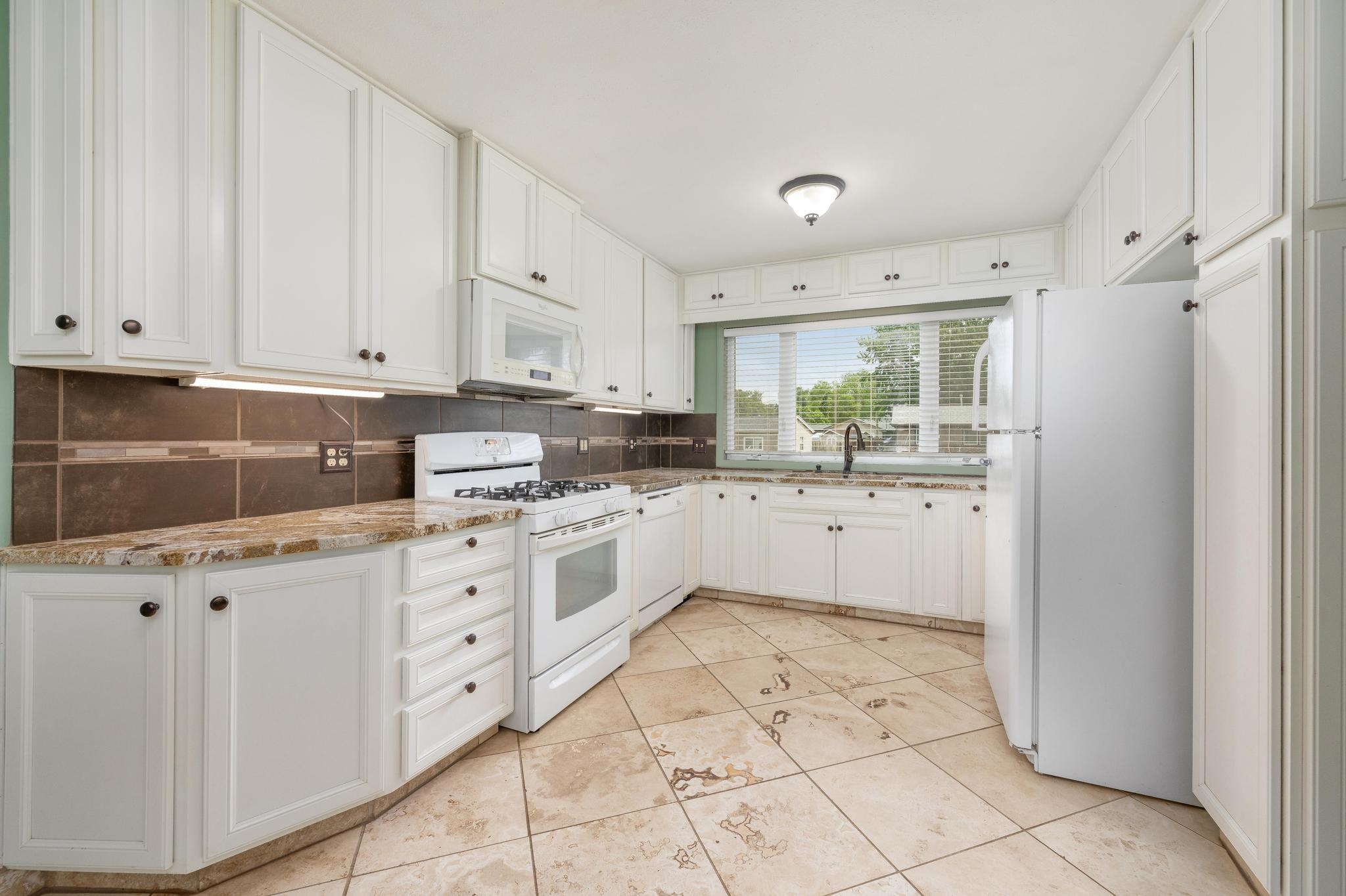 6523 N Kerman Drive Park City KS 67219