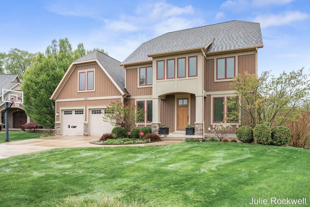 Ada MI, 4985 W Village Court SE