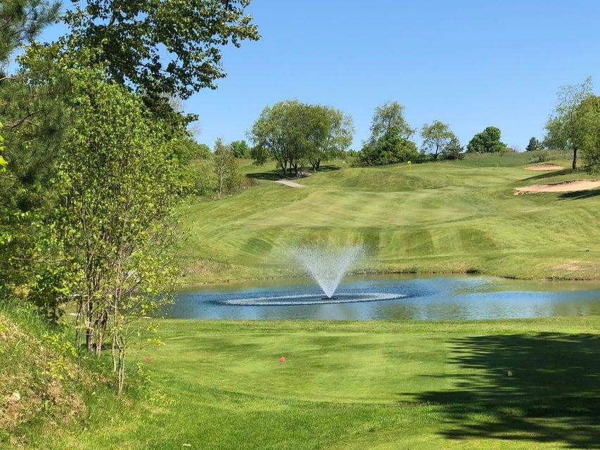 1975 + 1995 Clubhouse Drive Harbor Springs MI 49740