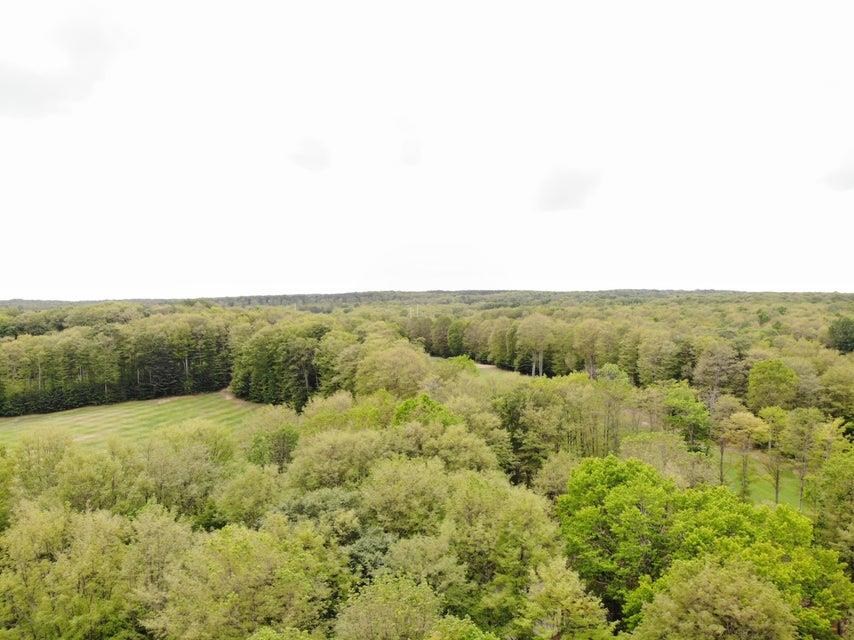 1975 + 1995 Clubhouse Drive Harbor Springs MI 49740