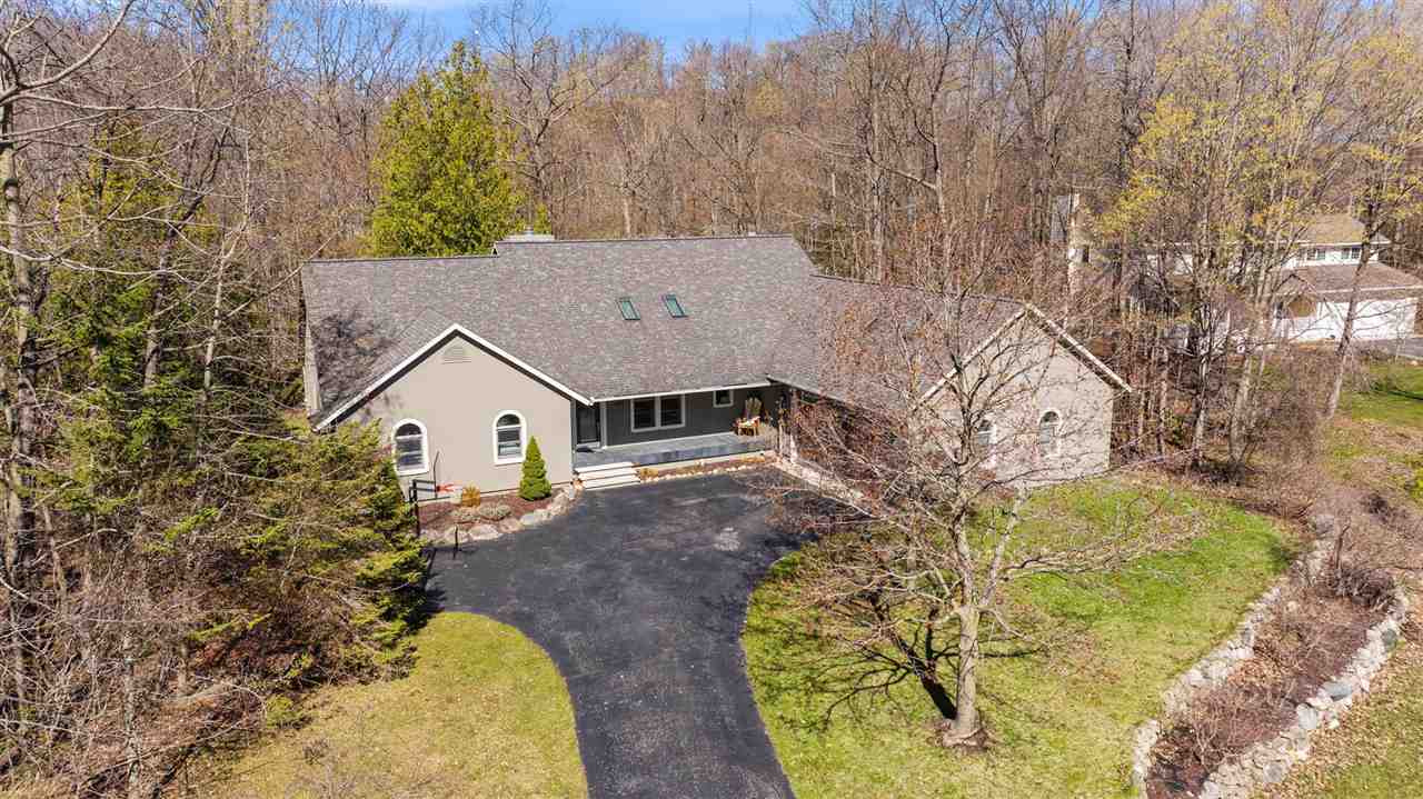 9045 North Pointe Woods Drive Charlevoix MI 48720