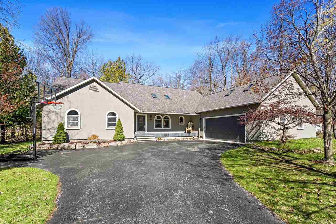 9045 North Pointe Woods Drive Charlevoix MI 48720