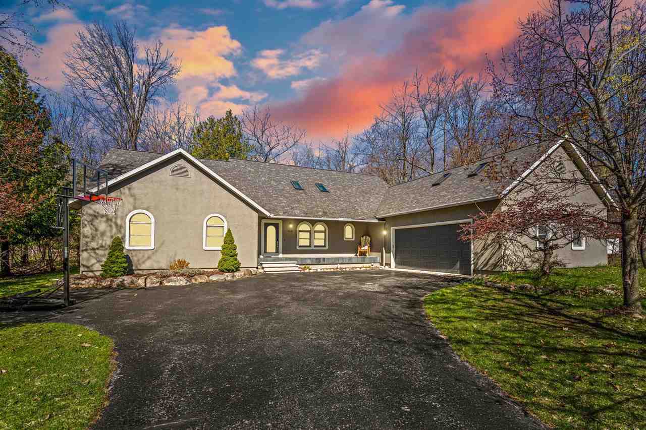 9045 North Pointe Woods Drive Charlevoix MI 48720