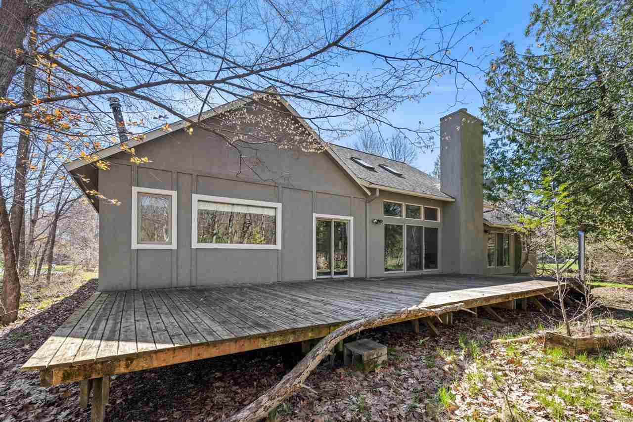 9045 North Pointe Woods Drive Charlevoix MI 48720