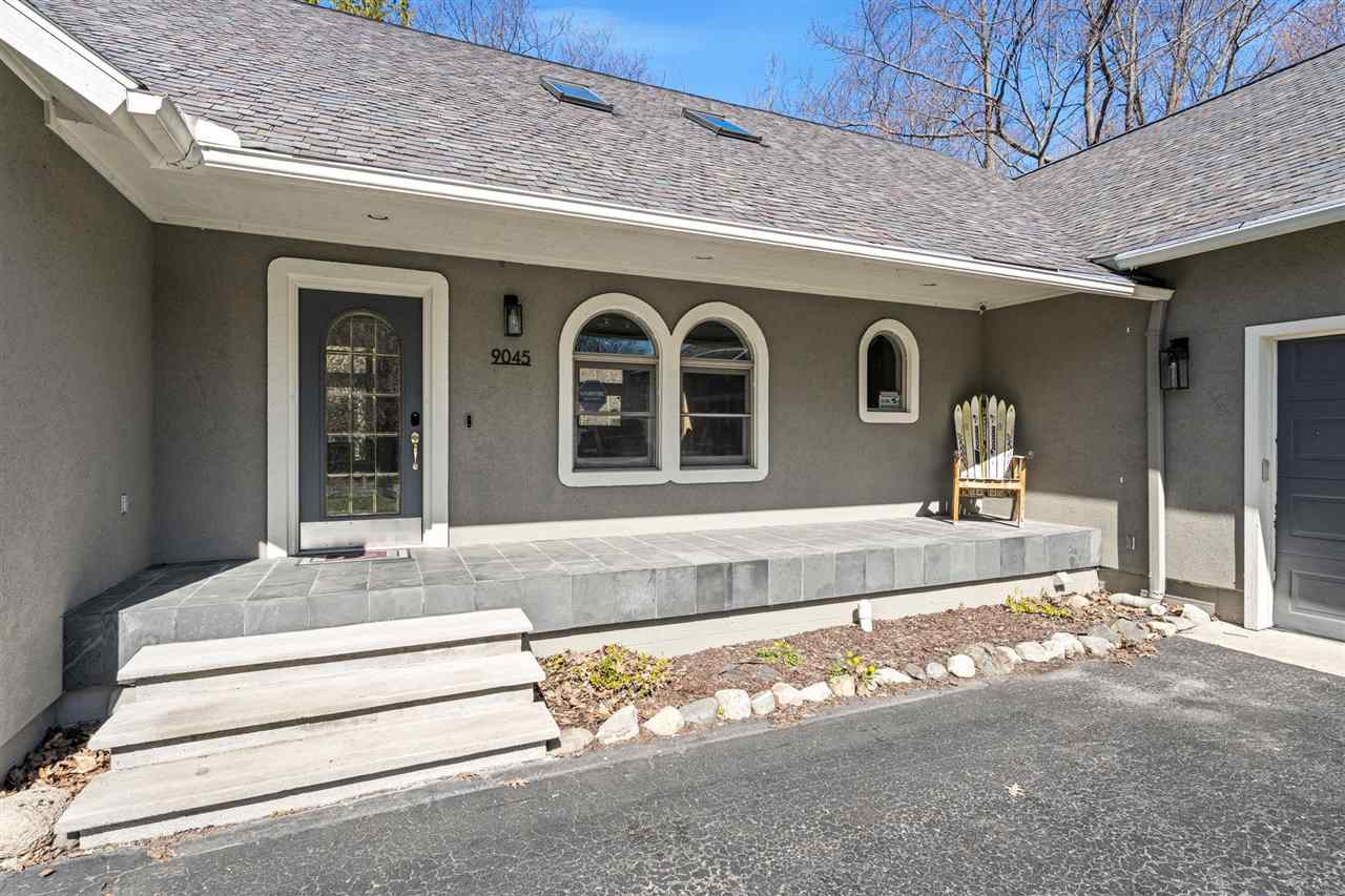 9045 North Pointe Woods Drive Charlevoix MI 48720