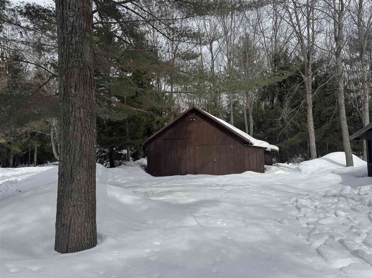 7125 Clinton Avenue Carp Lake MI 49718