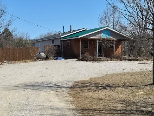 6704 NW Rapid City Road Rapid City MI 49676