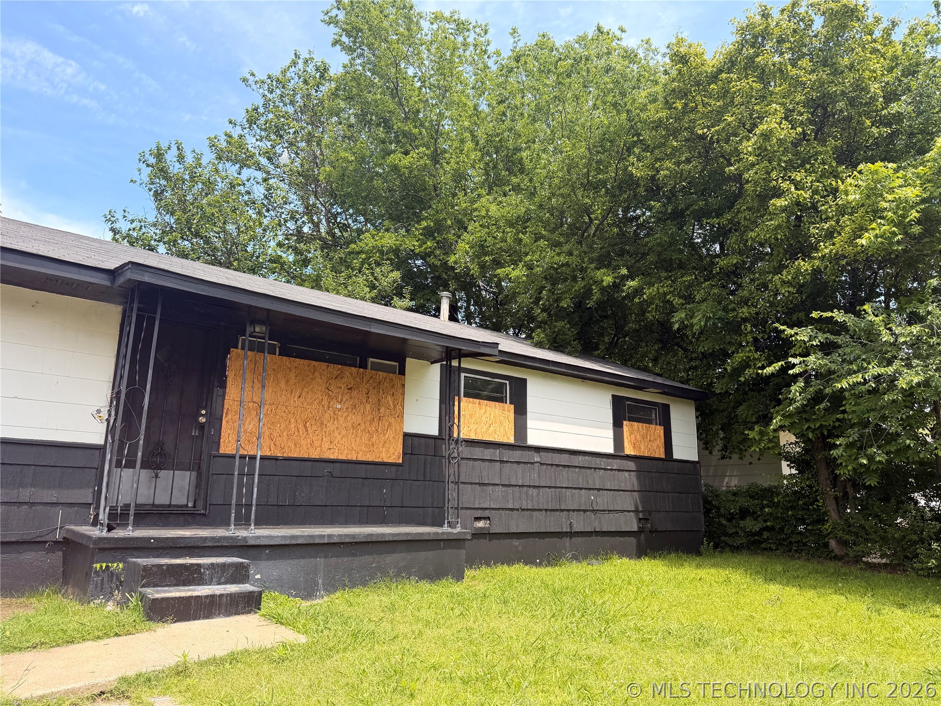 647 E 52nd Place N Tulsa OK 74126